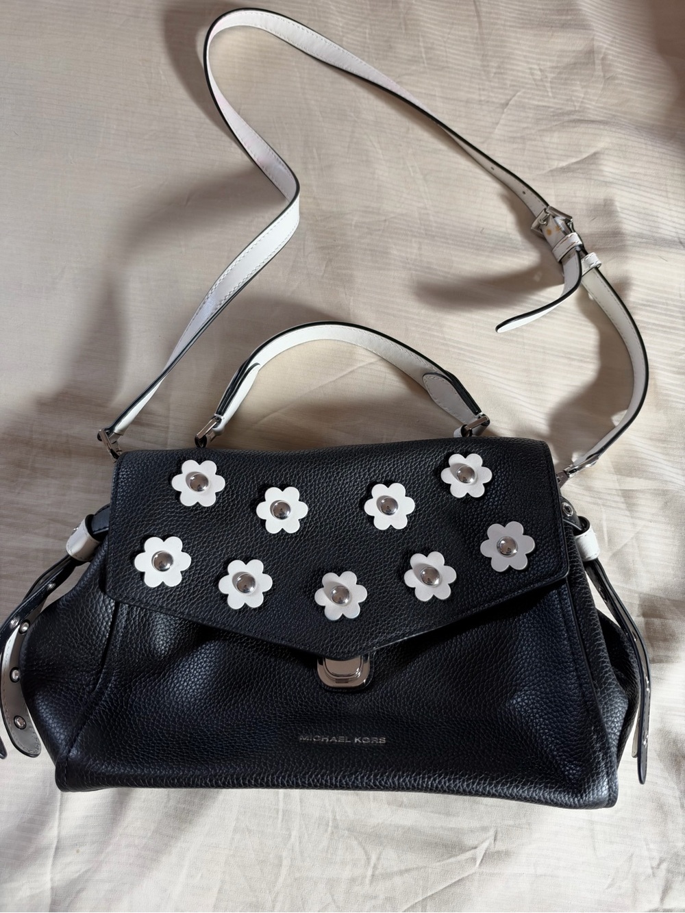 Michael Kors Black Pebbled Leather Satchel with White Flower Accents